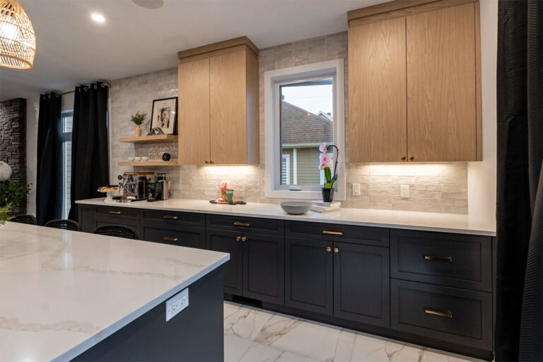Wide view of a custom black wood kitchen designed and installed by Club Cuisine BCBG in Laval
