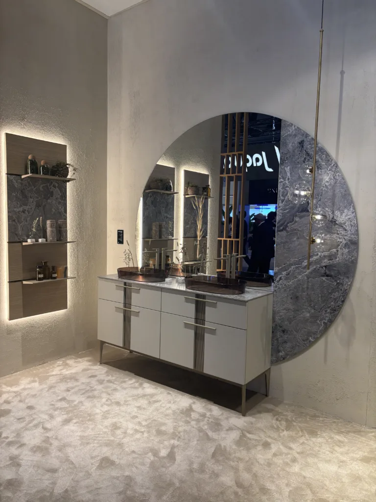 Half mirror half marble wall feature with integrated lighting in modern kitchen or bathroom interior