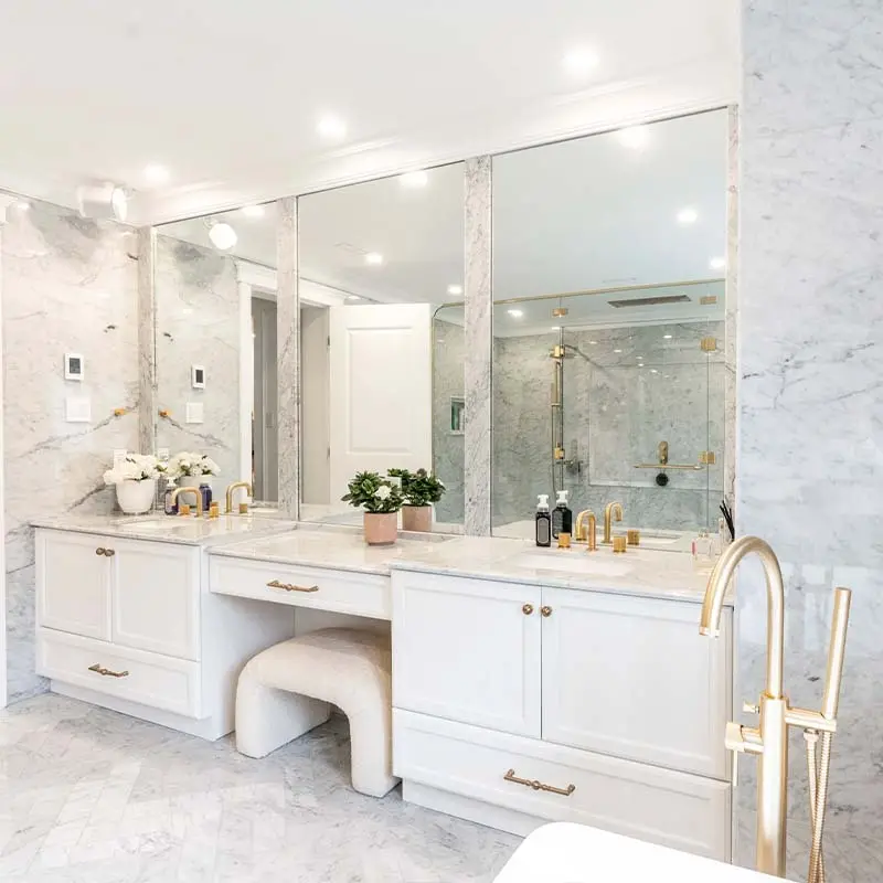 Custom white bathroom vanity with silver handles designed by Club Cuisine BCBG Laval